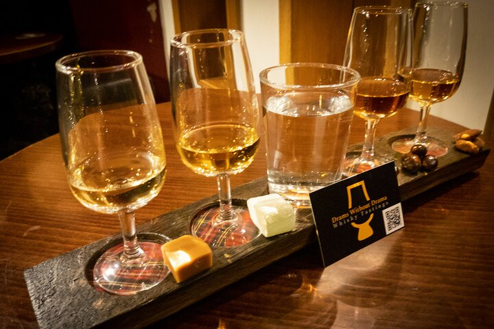 Savor the essence of Scotch in a cozy Edinburgh bar where expert guidance transforms each tasting into a personal journey through rich flavors and fascinating whisky history.